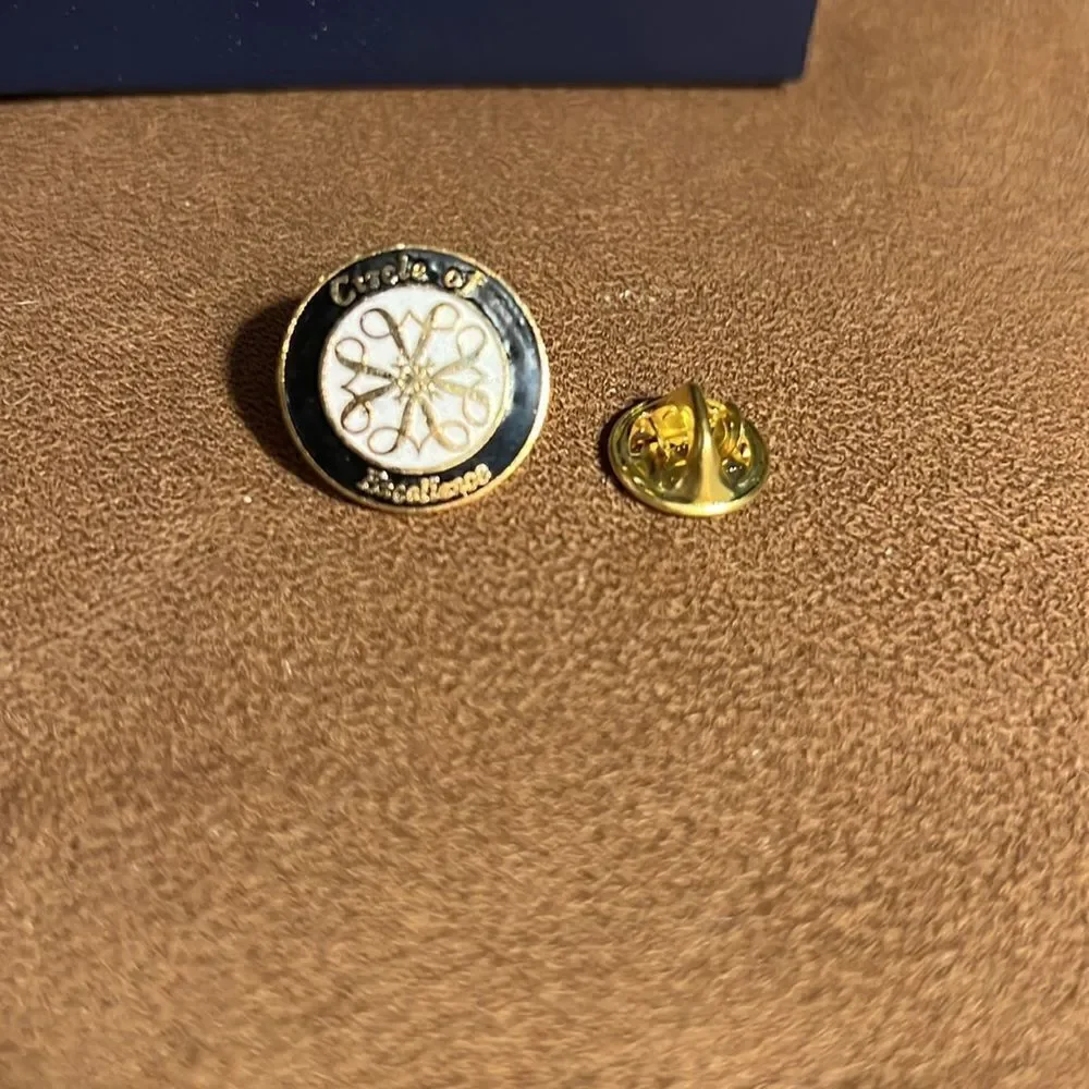 Avon Circle of Excellence pin.